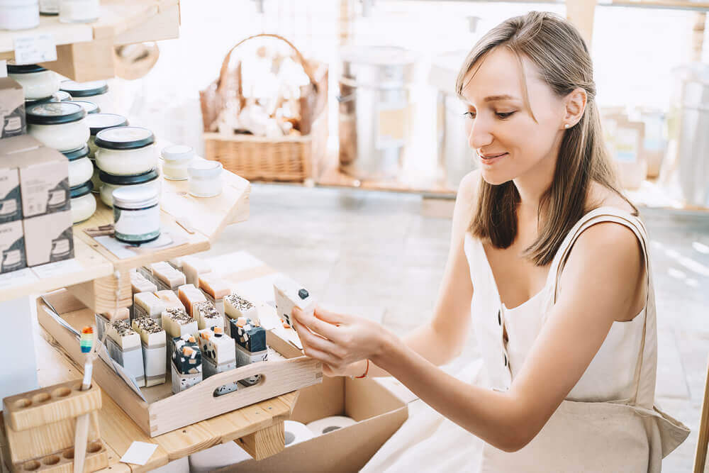 woman with cotton bag buying personal care